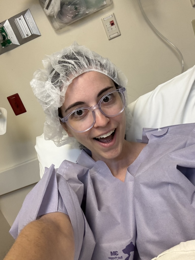 Carley smiling before a procedure